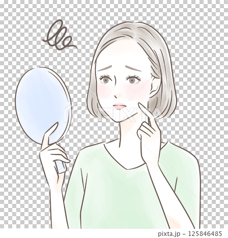 一位女士一邊看著手鏡,一邊擔心自己的臉頰 一位女士一邊看著手鏡,一邊擔心自己的臉頰 125846485