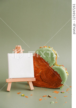 Delightful and vibrant heartshaped pastry croissant treat, beautifully topped with colorful frosting nut galore. Mock up template copy space. Food experimentation viral dessert creative Delightful and vibrant heartshaped pastry croissant treat, beautifully topped with colorful frosting nut galore. Mock up template copy space. Food experimentation viral dessert creative 125847261