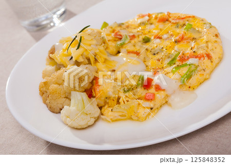 Omelet with cauliflower Omelet with cauliflower 125848352