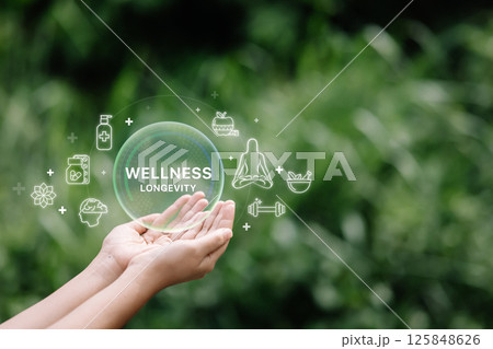 Hand holding virtual icons of wellness with nature background. Concept of mindfulness and healthy living 125848626