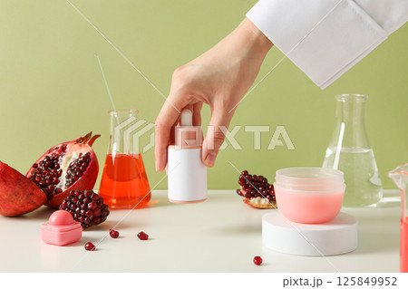 Self care and skincare products concept - pomegranate cosmetics 125849952