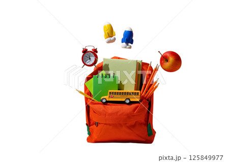 Backpack filled with notebooks, snacks, and school supplies, isolated on white 125849977