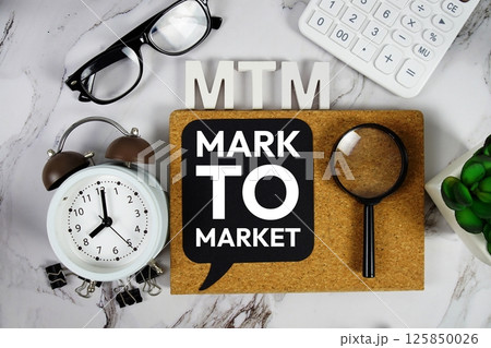 MTM - Mark To Market acronym with calculator, alarm clock and magnifying glass, Business concept background 125850026