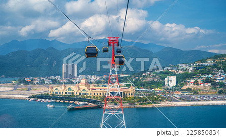 cable car cabins on cableway over sea at Vinpearl Amusement Park in Nha Trang cable car cabins on cableway over sea at Vinpearl Amusement Park in Nha Trang 125850834