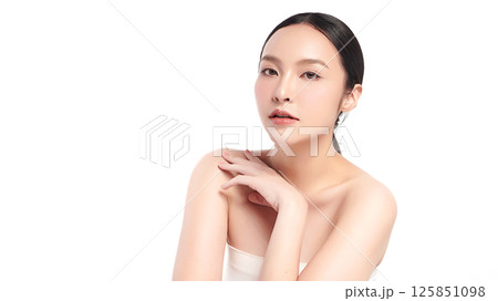 A beautiful young Asian woman with clean, fresh skin against a white background. Skincare, facial treatment, cosmetology, beauty, and spa. An elegant portrait of an Asian woman. A beautiful young Asian woman with clean, fresh skin against a white background. Skincare, facial treatment, cosmetology, beauty, and spa. An elegant portrait of an Asian woman. 125851098