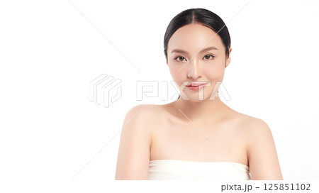 A beautiful young Asian woman with clean, fresh skin against a white background. Skincare, facial treatment, cosmetology, beauty, and spa. An elegant portrait of an Asian woman. A beautiful young Asian woman with clean, fresh skin against a white background. Skincare, facial treatment, cosmetology, beauty, and spa. An elegant portrait of an Asian woman. 125851102