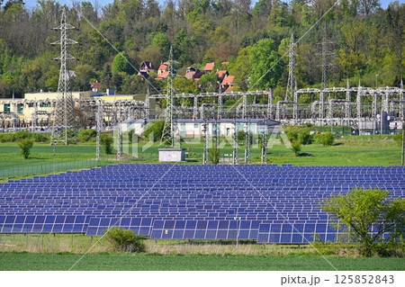 Electric power poles. Power plant - current distribution station. Concept for industry and technology with electricity. 125852843