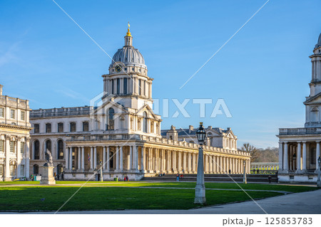 Historical buildings at Greenwich Campus in London showcase stunning architecture under clear blue skies. Historical buildings at Greenwich Campus in London showcase stunning architecture under clear blue skies. 125853783