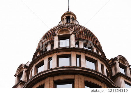 Historical architectural dome against clear sky for urban design inspiration in Paris 125854519