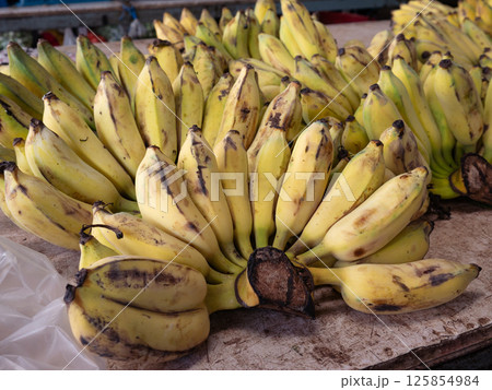 Ripe bananas display in a local market. 125854984
