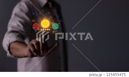 Young Man hand touching five star to review and give 5 stars Young Man hand touching five star to review and give 5 stars 125855475