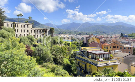 Villa Gualino on hill on sunny day. Liguria and an old traditional building. Sestri Levante - town on sea coast. Tourism and recreation. Villa Gualino on hill on sunny day. Liguria and an old traditional building. Sestri Levante - town on sea coast. Tourism and recreation. 125856187