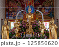 Nonthaburi, Thailand, March 15, 2025, Inside Wat Chimphli Sutthawat showcasing ornate decorations and golden statues in a serene atmosphere 125856620