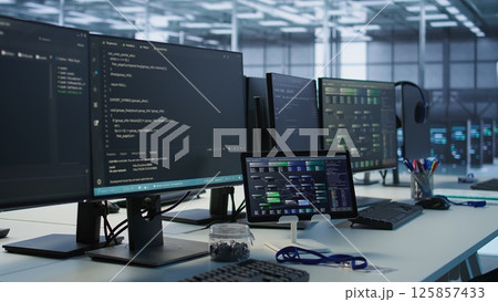 Data center facility employing deep learning technology to maintain company network infrastructure. Neural networks tech used in server room to ensure optimal system performance, handheld camera shot Data center facility employing deep learning technology to maintain company network infrastructure. Neural networks tech used in server room to ensure optimal system performance, handheld camera shot 125857433