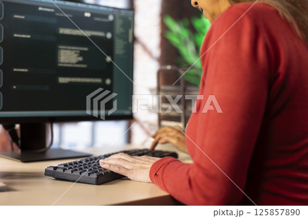 Smart AI assistant displayed on a computer monitor helping a person complete tasks, power of machine learning to streamline digital interactions and enhance web based connectivity. 125857890