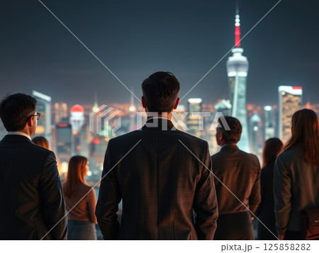 Global Business Team Overlooking City Global Business Team Overlooking City 125858282