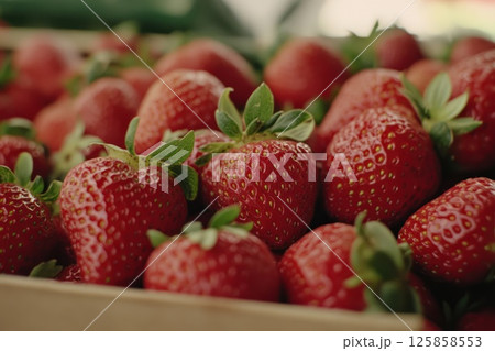 The strawberries in a rustic wooden box The strawberries in a rustic wooden box 125858553