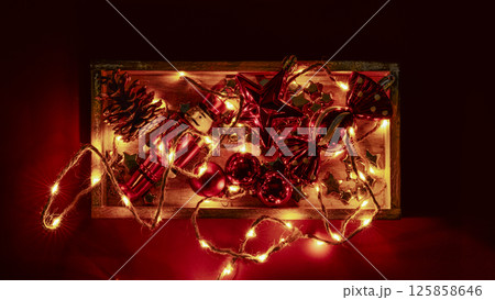 Christmas tree decorations and glowing lights Christmas tree decorations and glowing lights 125858646