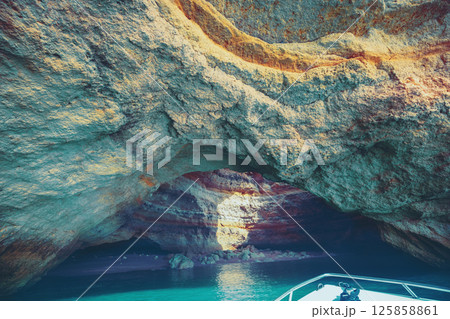 Coastal rocky seascape. Entrance in Benagil cave in Algarve region. Atlantic Ocean, Portugal, Europe 125858861