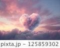 A giant heart shaped cloud made of fluffy pastel. Cloud heart shape sign. Big pink heartshaped fluffy cloud. 125859302