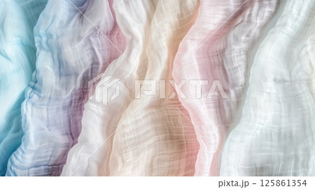 Soft, pastel-colored fabric drapes create a textured, dreamy background perfect for design projects 125861354