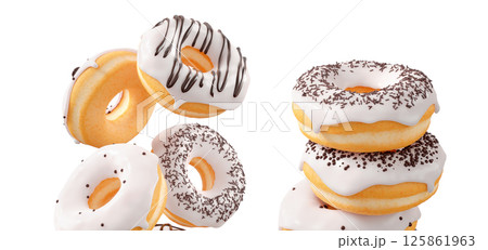 Donuts with white chocolate glaze, sprinkles, white drizzle, and dots isolated on white transparent background Donuts with white chocolate glaze, sprinkles, white drizzle, and dots isolated on white transparent background 125861963