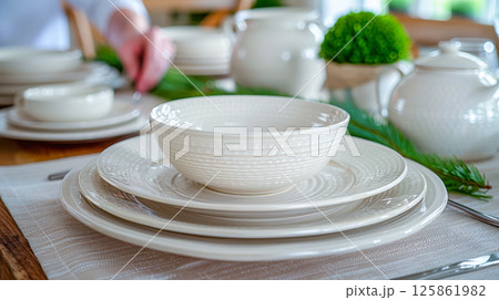 The table is elegantly set for celebrating Christmas or New Year. 125861982
