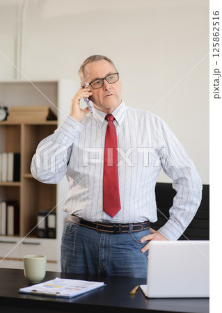 Businessman using laptop computer in office. success man, entrepreneur, small business owner working online. 125862516