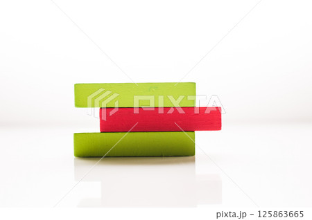 Children's wooden blocks for games. Close up of a puzzle for young children. 125863665