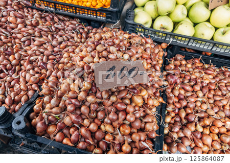 onion sets for planting are sold at the market 125864087
