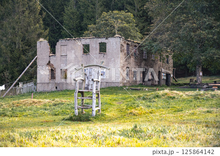 Explore the remains of the Konigsmuhle settlement nestled in the Ore Mountains of Czechia. This structure highlights the area's rich history amid a serene natural landscape. 125864142