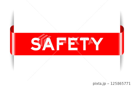 Red color inserted label banner with word safety on white background Red color inserted label banner with word safety on white background 125865771
