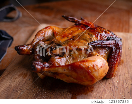 Juicy Rotisserie Chicken Ready to Serve. Juicy Rotisserie Chicken Ready to Serve. 125867886