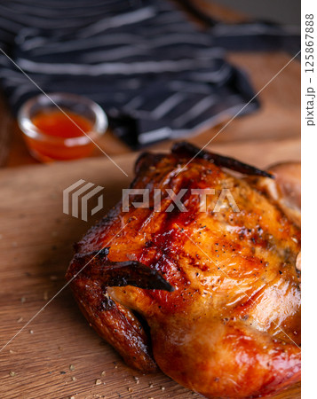 Crispy Roasted Whole Chicken Close-Up. Crispy Roasted Whole Chicken Close-Up. 125867888