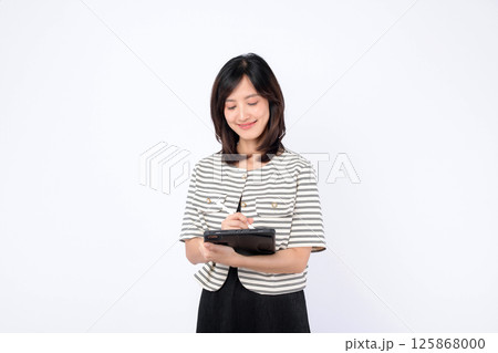 Southeast asian woman is creatively working on small business startup by managing her online retail store with digital tablet showing her passion for industry and shopping success Southeast asian woman is creatively working on small business startup by managing her online retail store with digital tablet showing her passion for industry and shopping success 125868000