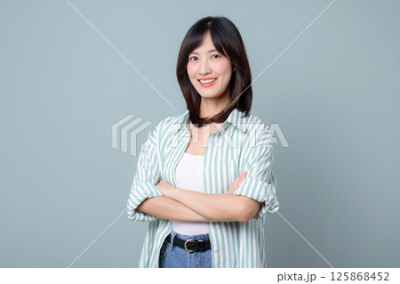 Southeast asian woman with creative smile stands confidently as small business owner in retail and online store startup industry showing success and optimism Southeast asian woman with creative smile stands confidently as small business owner in retail and online store startup industry showing success and optimism 125868452