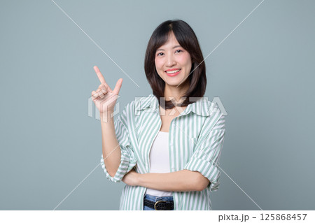 Southeast asian woman smiles confidently as small business owner in retail and online store industry, showcasing creative startup ideas for shopping success Southeast asian woman smiles confidently as small business owner in retail and online store industry, showcasing creative startup ideas for shopping success 125868457