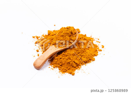 Dry Turmeric powder and turmeric root isolated on white background ,Top view Dry Turmeric powder and turmeric root isolated on white background ,Top view 125868989