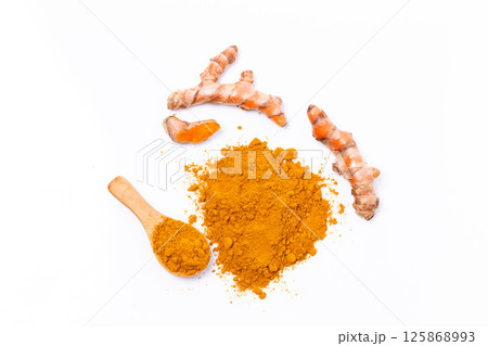 Dry Turmeric powder and turmeric root isolated on white background ,Top view Dry Turmeric powder and turmeric root isolated on white background ,Top view 125868993