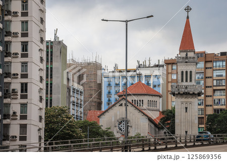 May 5 2025 Historic Church Building with Tree-Lined Grounds and Clear Sky May 5 2025 Historic Church Building with Tree-Lined Grounds and Clear Sky 125869356