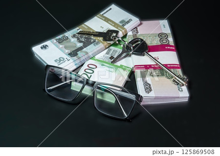 Bundles of money 125869508
