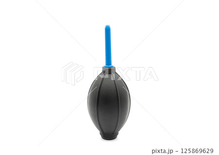 A manual air blower. Rubber air blower for cleaning dust from the camera and lens. Isolated on white 125869629