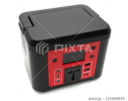 Isolated on white portable power station. Big power bank for charging devices Isolated on white portable power station. Big power bank for charging devices 125869633
