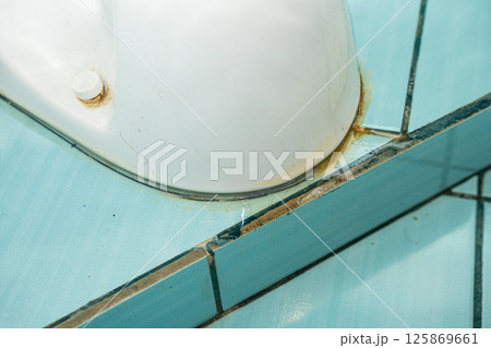 The lower part of the toilet is dirty with hair. Hygiene concept The lower part of the toilet is dirty with hair. Hygiene concept 125869661