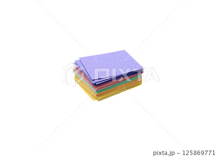 Stack of multicolor sticky note pads isolated on white Stack of multicolor sticky note pads isolated on white 125869771