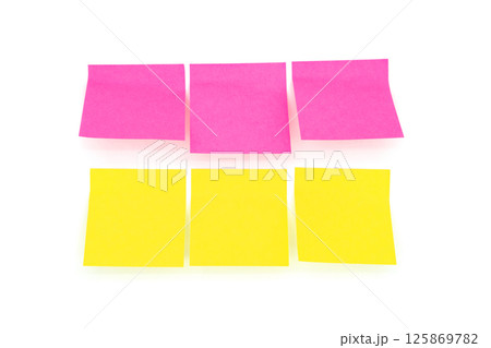 Reminder notes isolated on the white background. Yellow and pink sticky notes Reminder notes isolated on the white background. Yellow and pink sticky notes 125869782