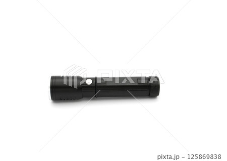 Modern black metal flashlight isolated on white 125869838