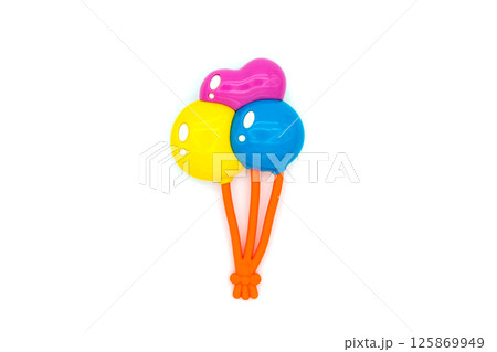 Colorful baby toy isolated on white Colorful baby toy isolated on white 125869949