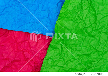 Multicolored crumpled paper texture background. Wrinkled paper surface for designs 125870088