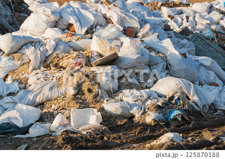 Pile of construction debris. Bags with construction debris. Construction waste Pile of construction debris. Bags with construction debris. Construction waste 125870188